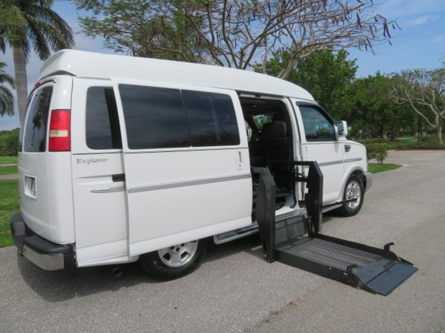 2010 White /Gray Chevrolet Express (1GNUGCD48A1) , located at 4301 Oak Circle #19, Boca Raton, FL, 33431, (954) 561-2499, 26.388861, -80.084038 - You are looking at a Gorgeous 2010 Chevy Express Handicap Wheelchair Conversion Van Explorer Limited SE with 31K Original Miles, Braun Century 750lb Side Entry Wheelchair lift, Tie Down System in the Floor, Rear Entertainment with Flat Screen TV/DVD, Leather Interior, Rear Power Folding Bench Seat/b - Photo#43